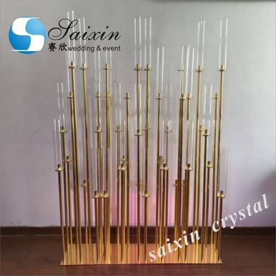 Beautiful gold metal candle holder for wedding decorating backdrop
