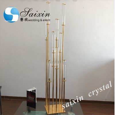 Beautiful gold metal candle holder for wedding decorating backdrop